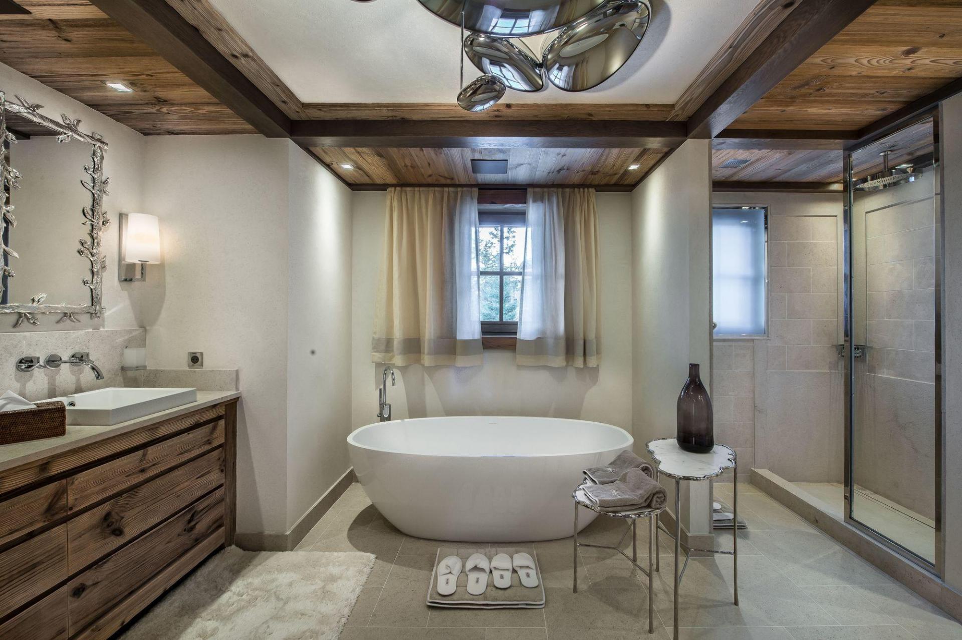 ONE OF THE BEAUTIFUL BATHROOMS IN CHALET DES CHENUS IN THE FRENCH ALPS